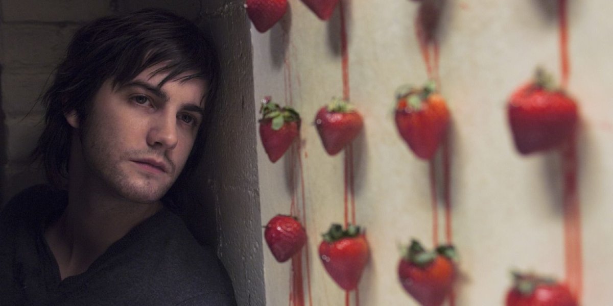 Across The Universe Jim Sturgess stares at strawberries on a canvas