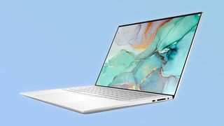 Dell XPS 15 deals: a Dell XPS 15 on a blue background