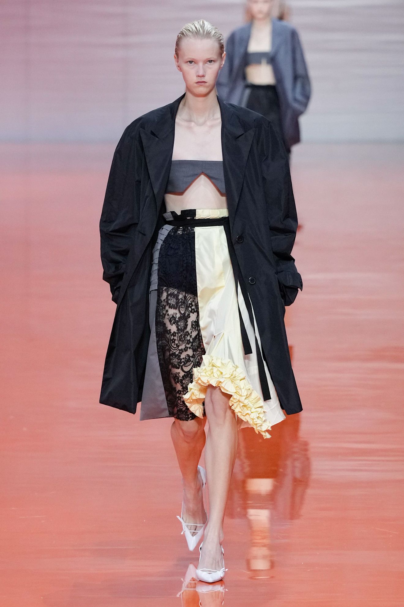 A Prada model wearing a Frankenstein skirt in the S/S 26 show.