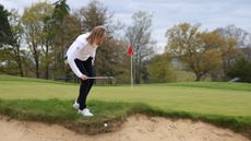 Can I ground my club on the lip of a bunker?
