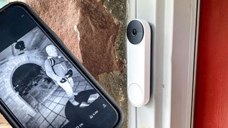 A smartphone showing images captured by Nancy Guthrie's video doorbell next to Nest Doorbell (battery) mounted outside a home
