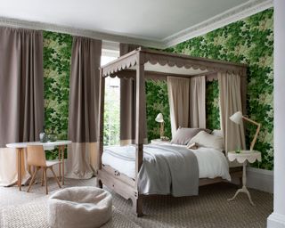 An example of bed ideas showing a four-poster bed in a room with a botanical theme