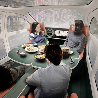 Interior of electric vehicle configured as a dining room