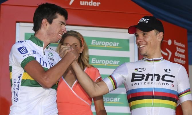 Damien Howson and Philippe GIlbert shake hands on the podium after spending 120km in the break together