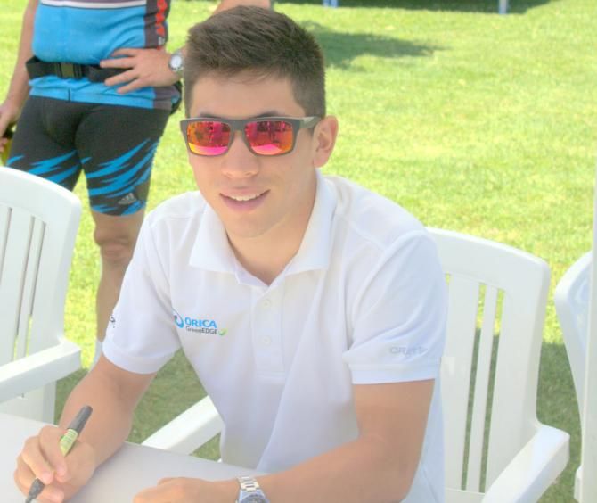 Caleb Ewan signing photographs for fans at the Orica-GreenEdge winery and ridges ride