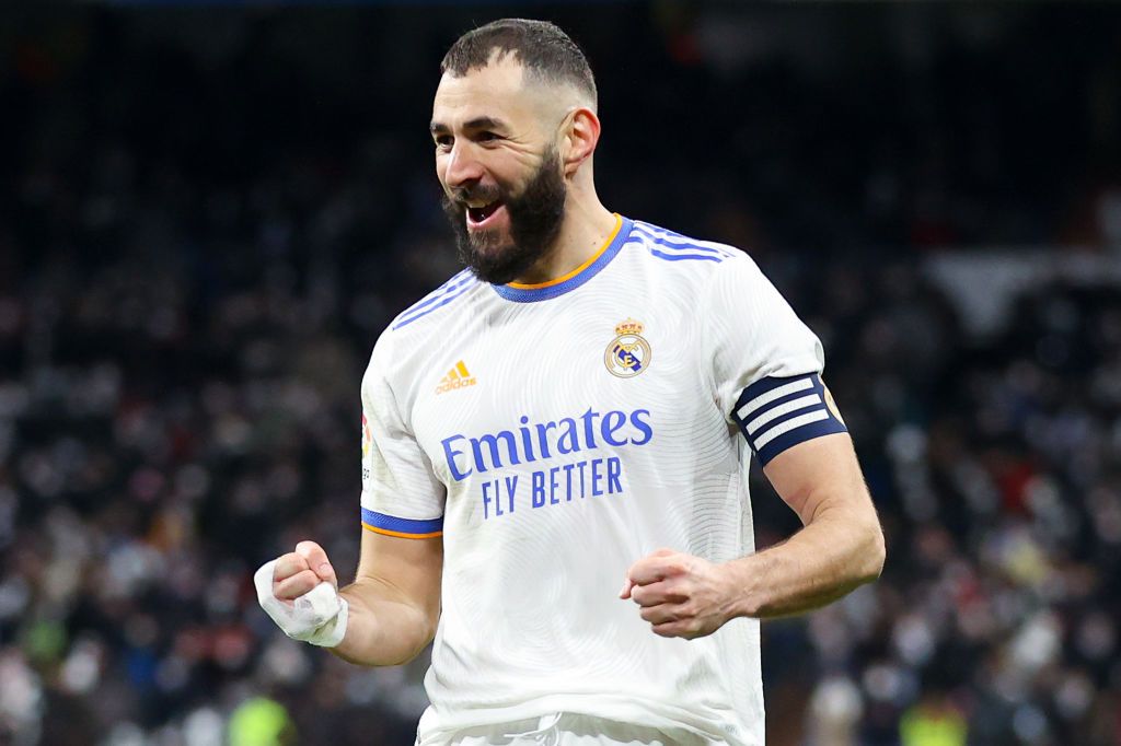 Karim Benzema of Real Madrid CF celebrates after scoring his team&#039;s fourth goal during the La Liga Santader match between Real Madrid CF and Valencia CF at Estadio Santiago Bernabeu on January 8, 2022 in Madrid, Spain. 