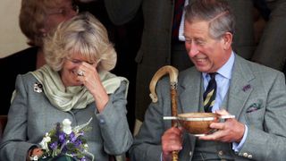 King Charles most memorable moments - Prince Charles and Camilla giggle whilst drinking whisky from a Quaich