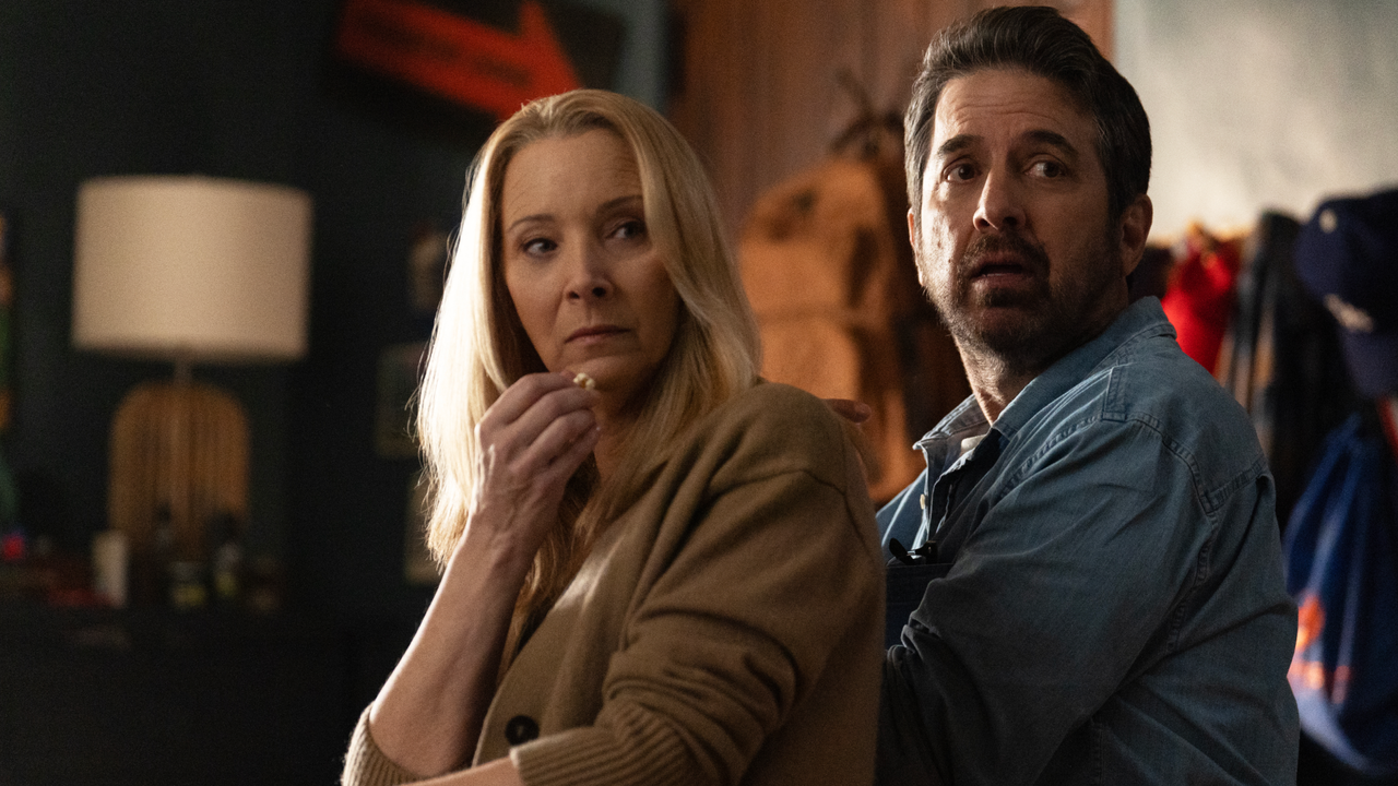 lisa kudrow and ray romano as the morgans looking surprised in no good deed