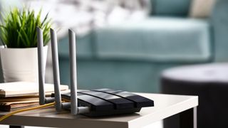 A Wi-Fi router sat on a living room table