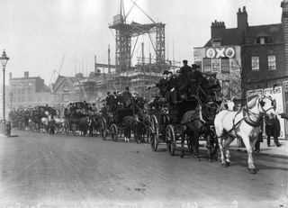 Football fans on their way to the FA Cup final between Everton and Newcastle in April 1906.