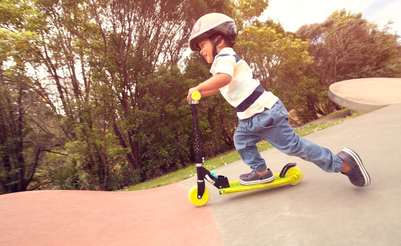 kid on scooter