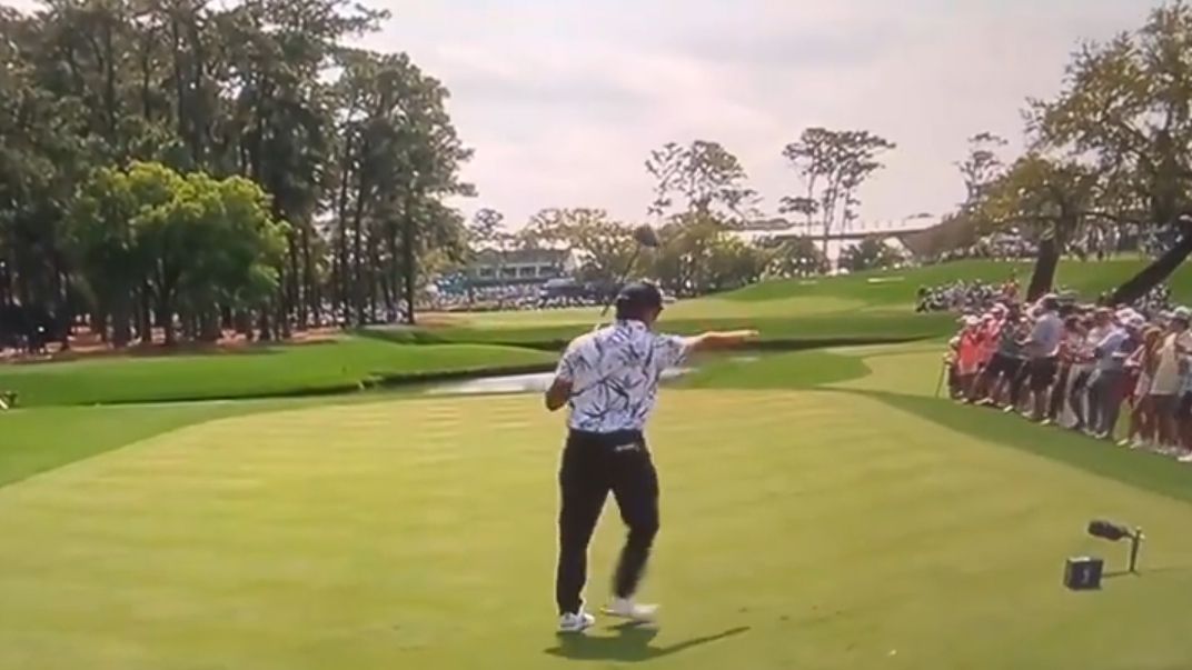 Rickie Fowler points at a fan at The Players Championship