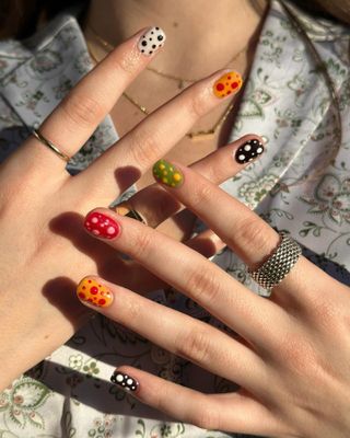 Polka dot nail art manicure by Hang Nguyen