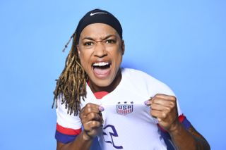 Jess McDonald posing with the USWNT badge