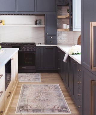 Black cabinets, white tiles, carpet