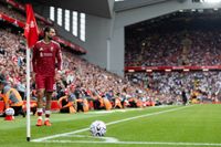 Dominik Szoboszlai prepares to take a corner for Liverpool