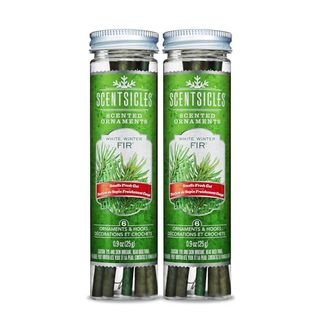 Two green screw-lid pots of Scentsicles 