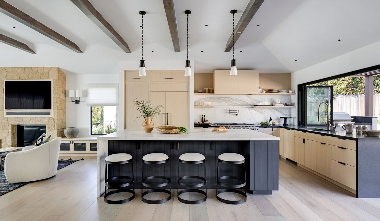 A modern kitchen with a breakfast bar island