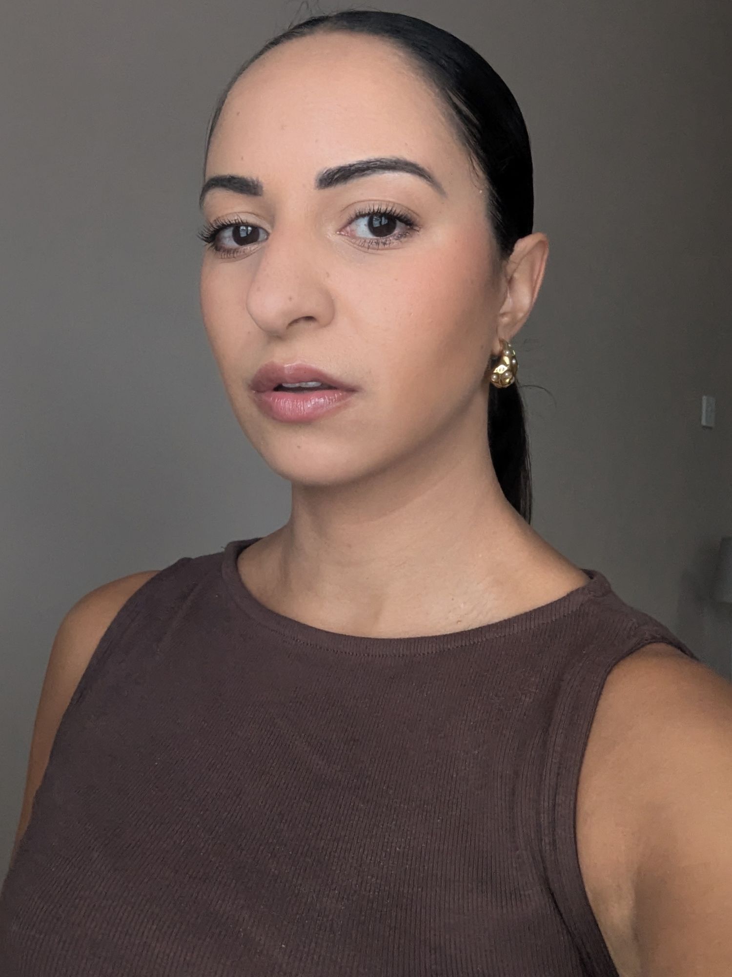 Jazzria Harris wearing Anastasia Beverly Hills Impeccable Blurring Second Skin Matte Foundation