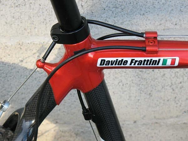 Blue joins the carbon fiber tubes with aluminum lugs to provide joint strength. The rear brake hanger is neatly integrated into the seat cluster.