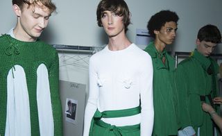 Males modelling the colours green and white
