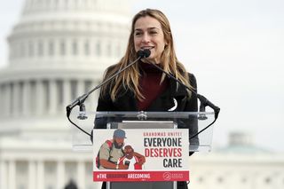 Dawn Huckelbridge, Director, Paid Leave for All, speaks at a rally in front of the U.S. Capitol Building on December 09, 2021 in Washington, DC.