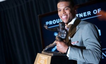 Despite an NCAA investigation into his recruitment, Auburn quarterback Cam Newton won the Heisman Trophy.