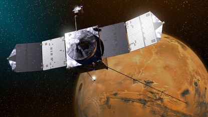 An illustration of MAVEN in orbit around Mars