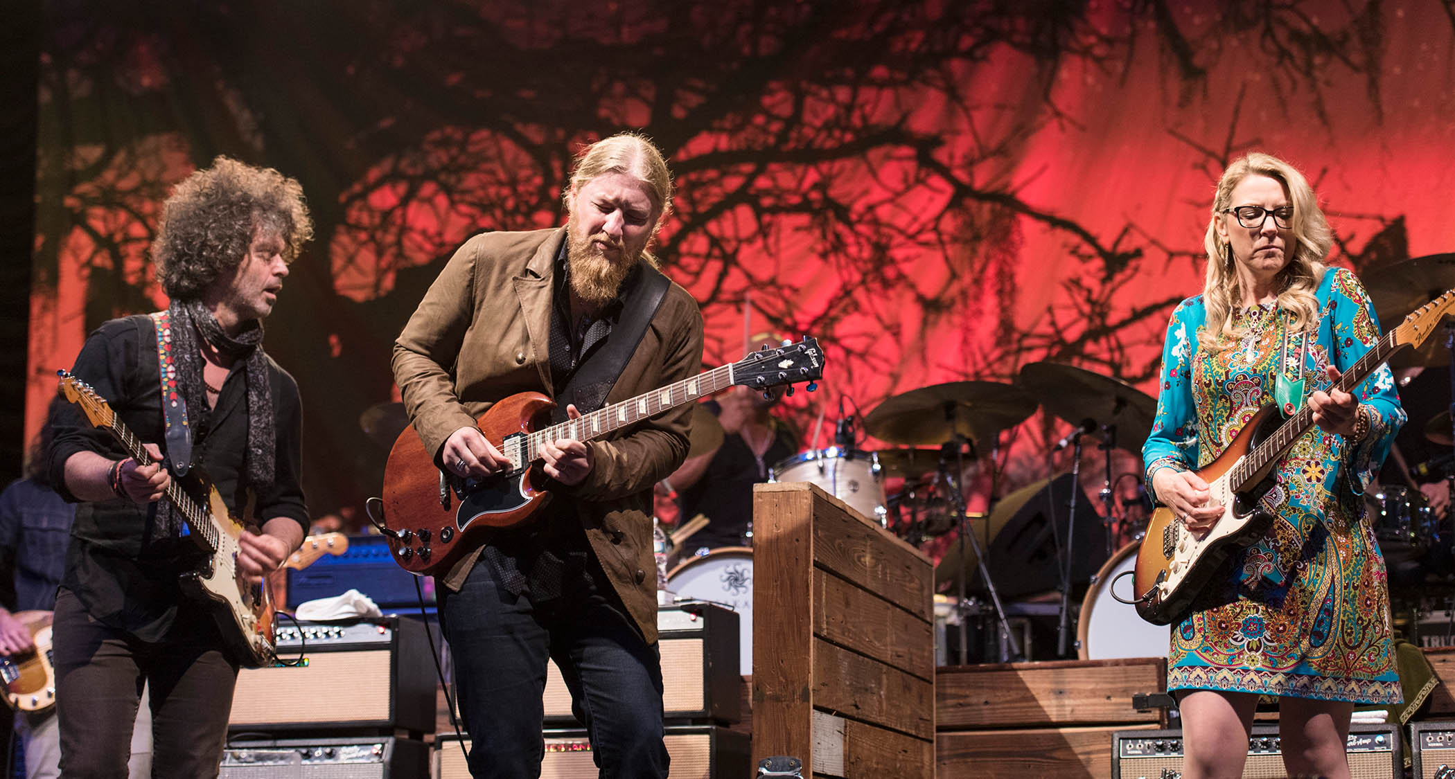 Tedeschi Trucks Band and Doyle Bramhall II [far-left] jam onstage at the 30th Anniversary season of Central Park SummerStage, New York, in 2015.