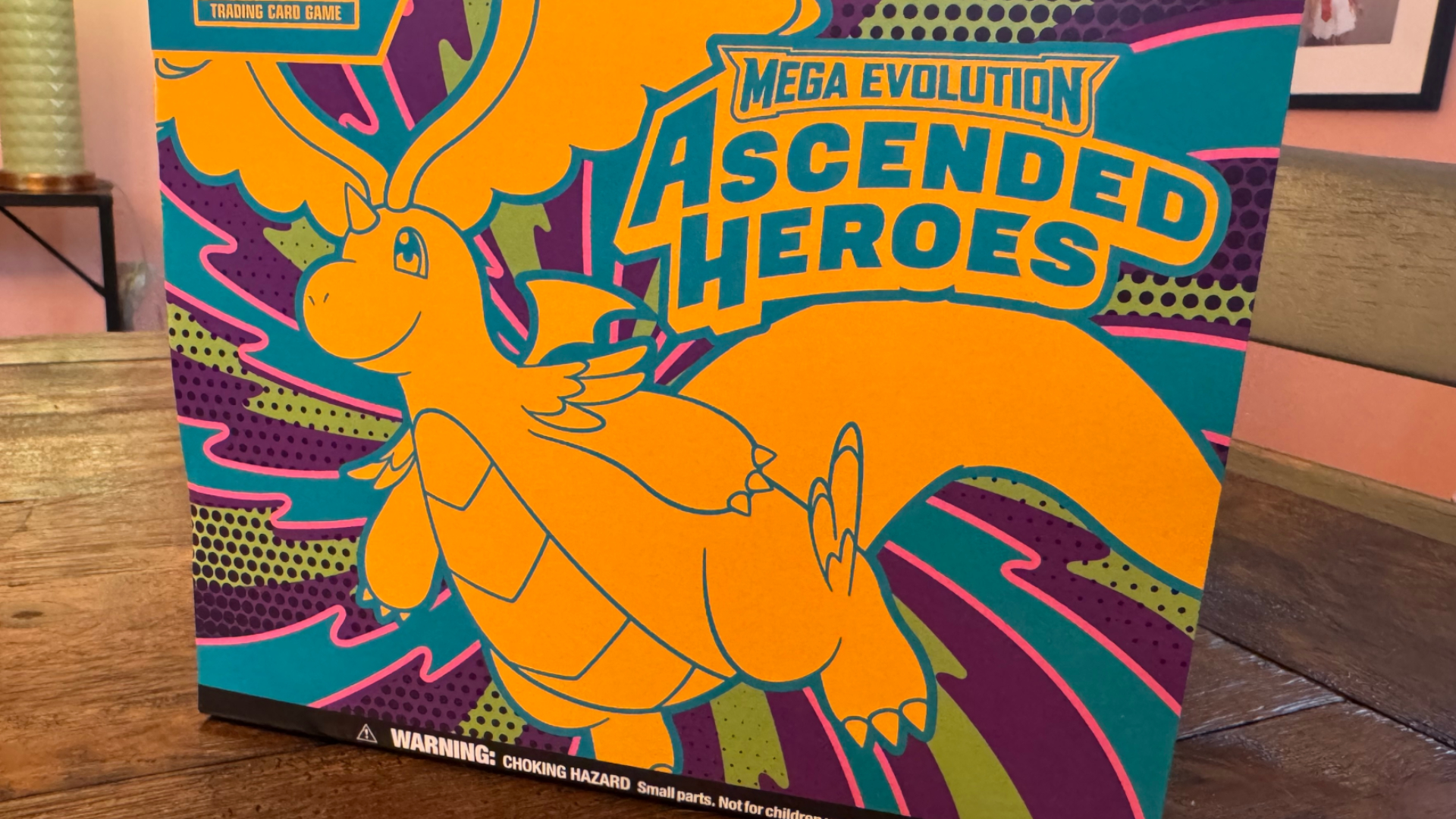 Ascended Heroes Mega Evolution Elite Trainer Box on a wooden table