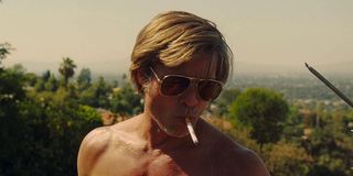 Brad Pitt smoking and doing work in Once Upon A Time In Hollywood