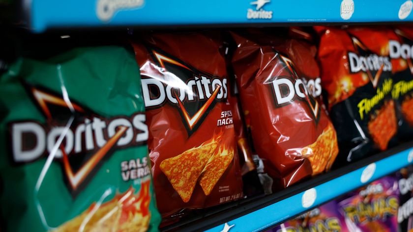 Packages of Doritos chips are displayed on a store shelf on April 23, 2025 in San Anselmo, California. Health and Human Services Secretary Robert F. Kennedy Jr. announced plans to phase out all artificial dyes from the food supply by the end of 2026. The Food and Drug Administration is directing the food industry to replace petroleum-based synthetic dyes with natural alternatives