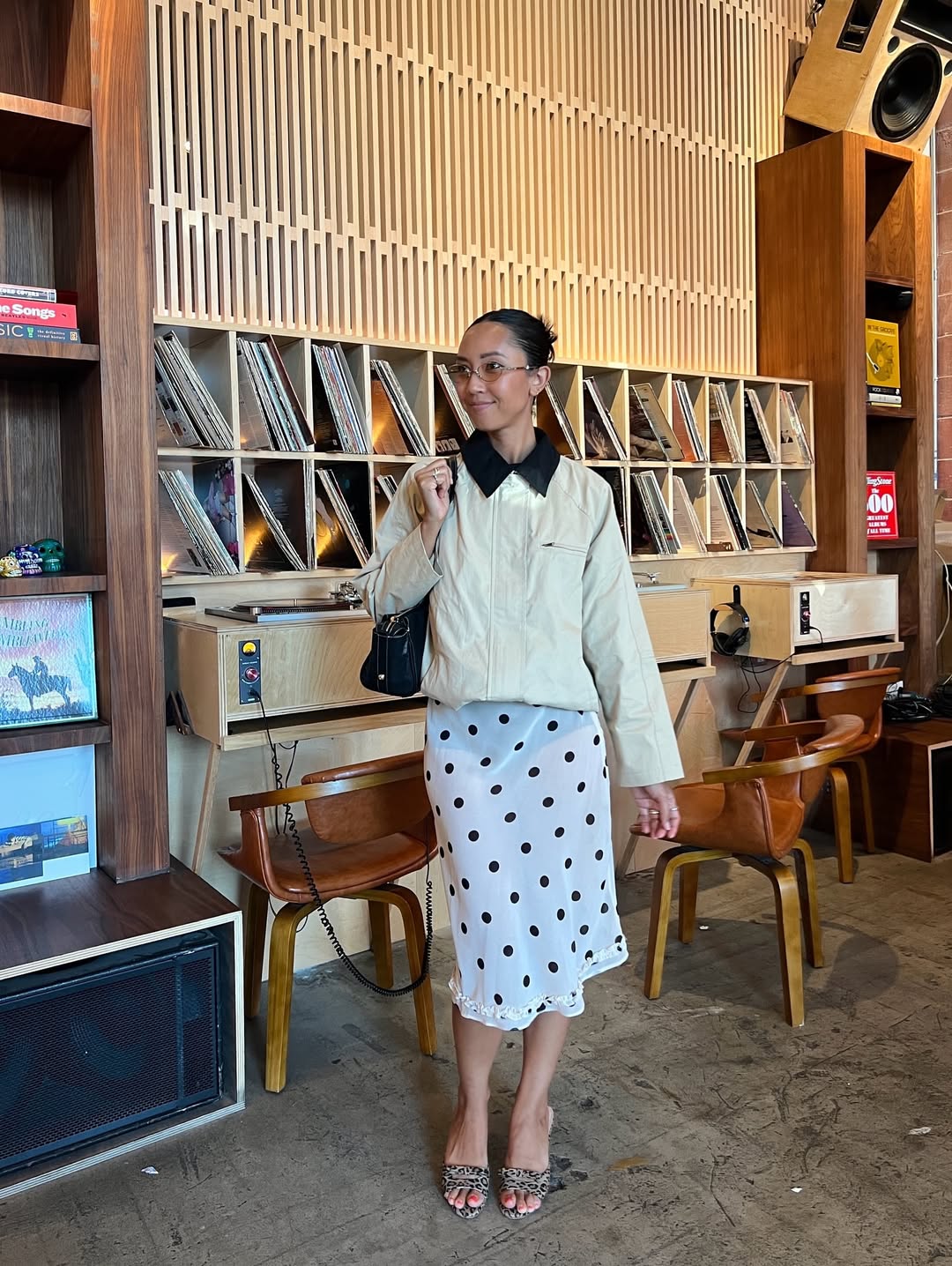 Stephanie Arant in a barn jacket and sheer skirt.