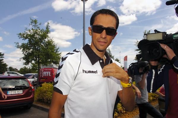 Alberto Contador arrives at a pre-Tour de France press conference.