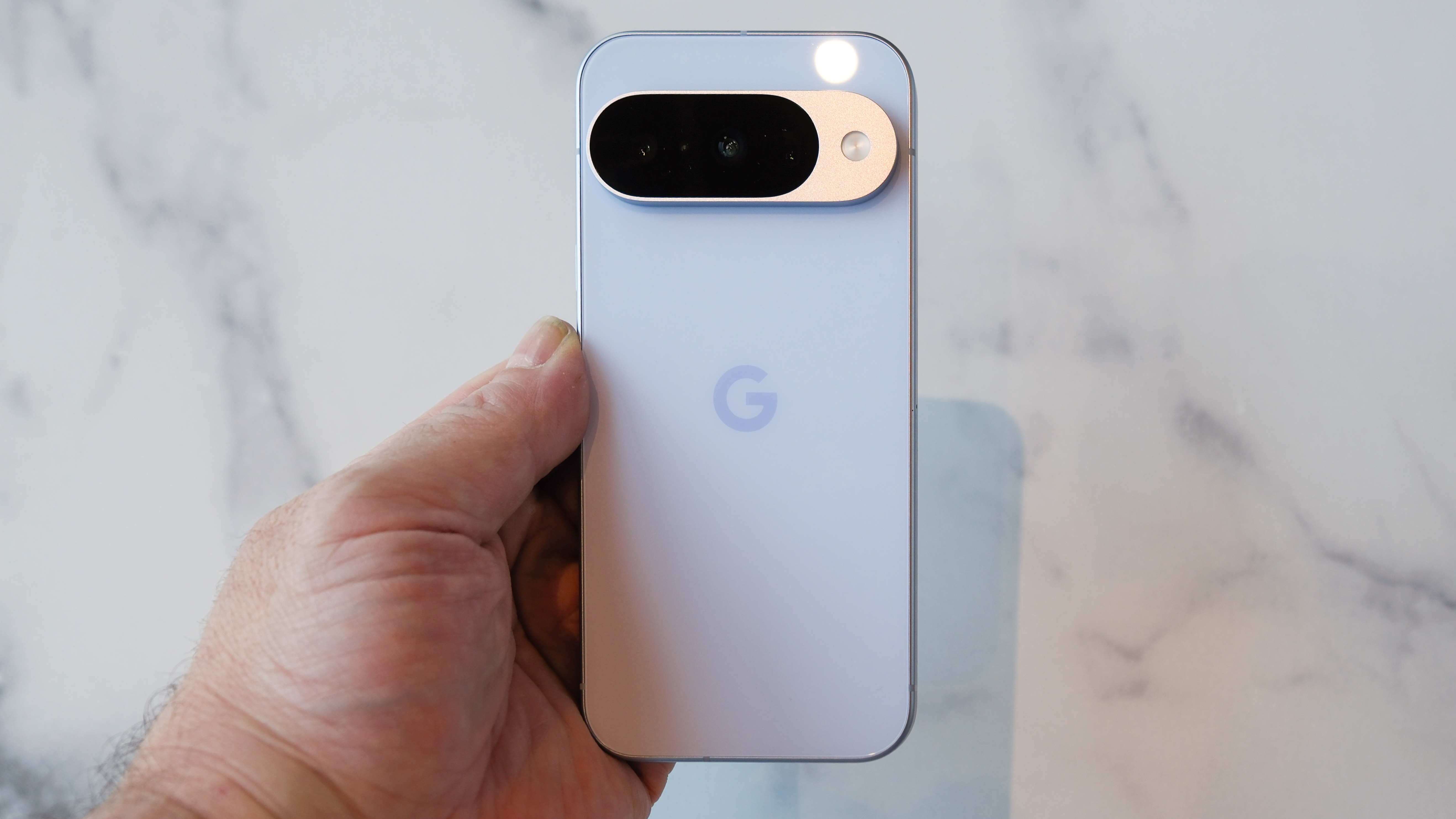 Google Pixel 10 showing back and camera bump in frost