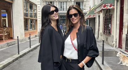 Kaia Gerber and Cindy Crawford attend the 2024 Paris Olympics together in matching navy outfits