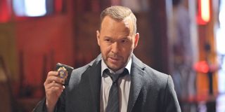 donnie wahlberg's danny reagan showing his badge on blue bloods season 11
