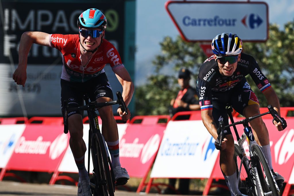 PICO VILLUERCAS SPAIN AUGUST 20 Primoz Roglic of Slovenia and Team Red Bull Bora hansgrohe R crosses the finish line as stage winner ahead of Lennert Van Eetvelt of Belgium and Team Lotto Dstny L during the La Vuelta 79th Tour of Spain 2024 Stage 4 a 1705km stage from Plasencia to Pico Villuercas 1544m UCIWT on August 20 2024 in Pico Villuercas Spain Photo by Dario BelingheriGetty Images