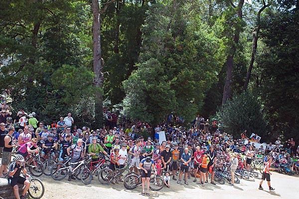 Riders are briefed in the shade before the start in Rosebery.