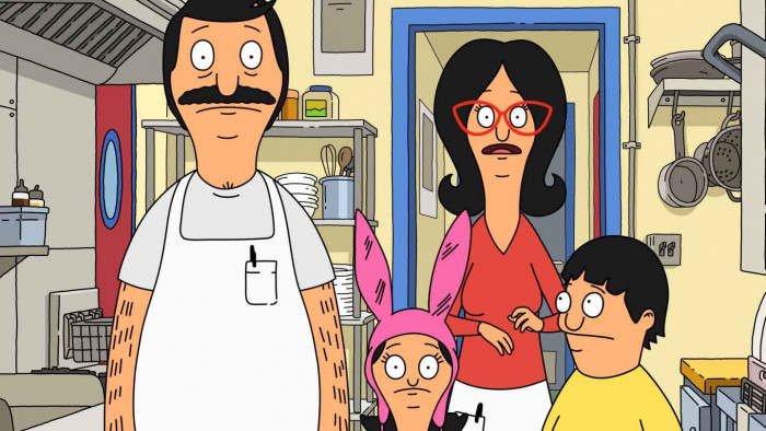Bob, Linda, Louise and Gene standing in the kitchen of the featured restaurant in Bob's Burgers