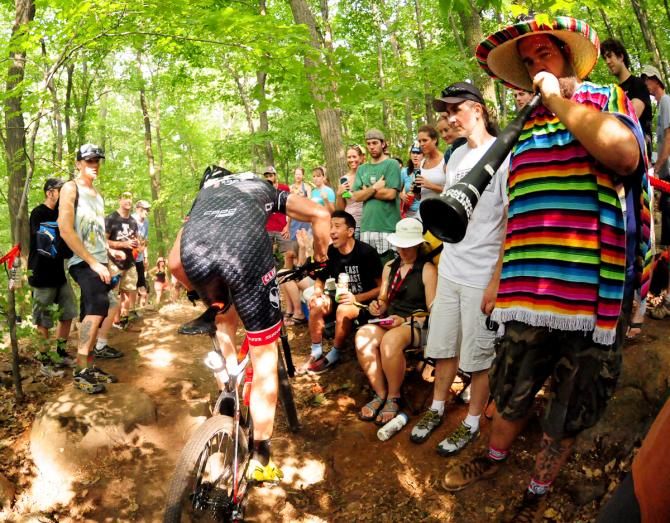 Troy Wells (Clif Bar) is cheered by energetic fans near the top of the course