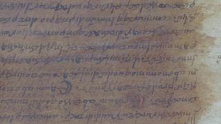 A portion of ancient text written on parchment.