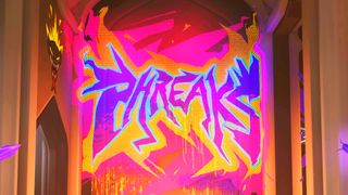 Bright purple, pink, and yellow graffiti that says Phreaks in the Overwatch season 13 trailer