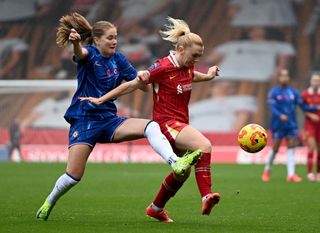 Ceri Holland of Liverpool and Sjoeke Nusken of Chelsea in action during the Barclays Women's Super League match between Liverpool and Chelsea at The St Helens Stadium on November 10, 2024 in St Helens, England.