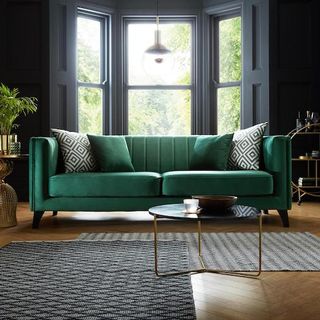 green velvet sofa in living room fluted fluting reeded reeding