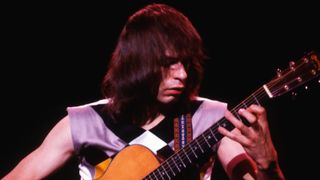 Steve Howe is perform with Asia when the performed at the Stockton Fox Theater in Stockton, California on May 24, 1982.