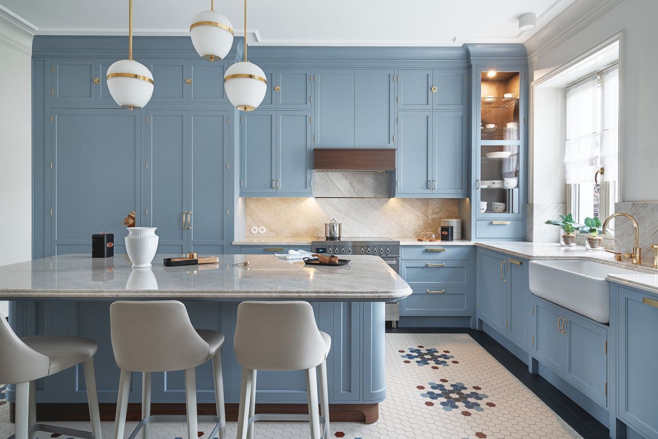 A kitchen with colorful cabinets