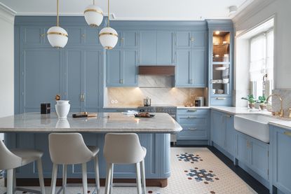 A kitchen with colorful cabinets