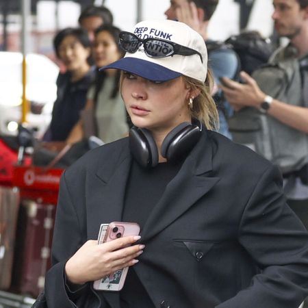 Madelyn Cline wearing a baseball cap