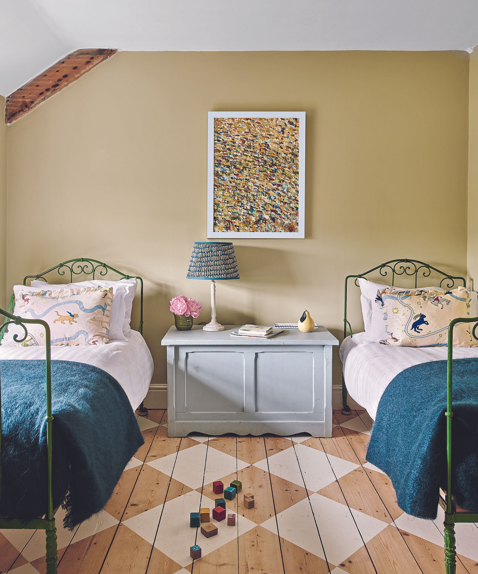 Toy storage in a shared bedroom with chequered floor